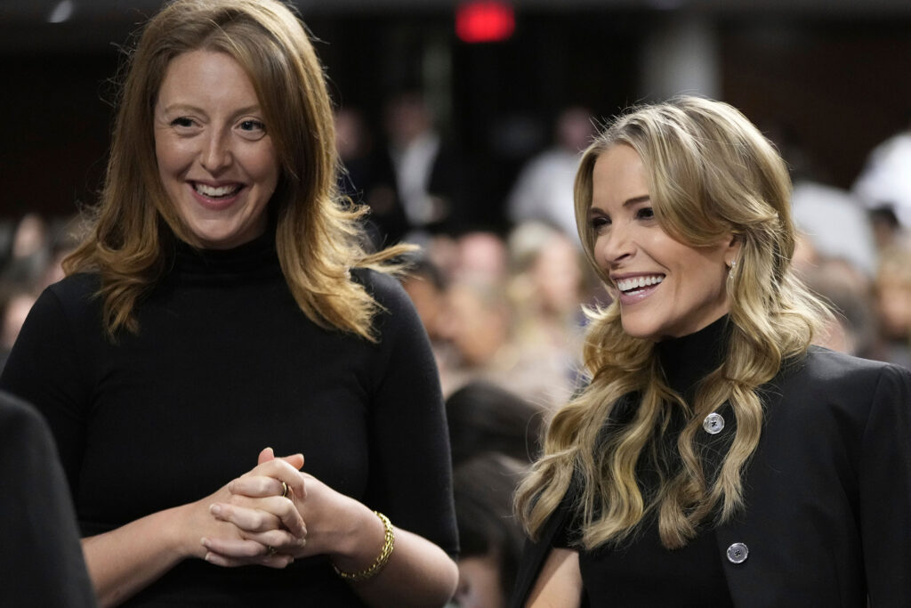 FILE - Dr. Casey Means, a wellness influencer, left, and journalist Megan Kelly, attend a confirmation hearing for Robert F. Kennedy Jr. for the Secretary of Health and Human Services post, at the Capitol in Washington, Jan. 29, 2025.  (AP Photo/Ben Curtis, File)
