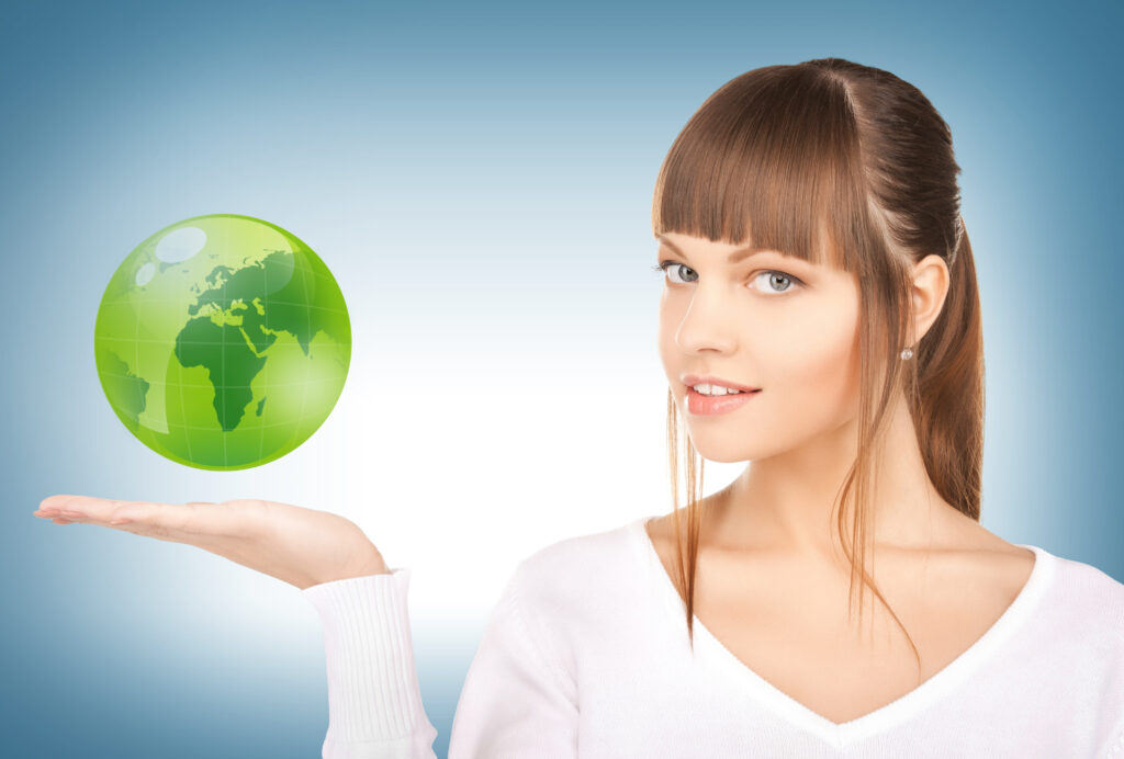 picture of woman holding green globe on her hand